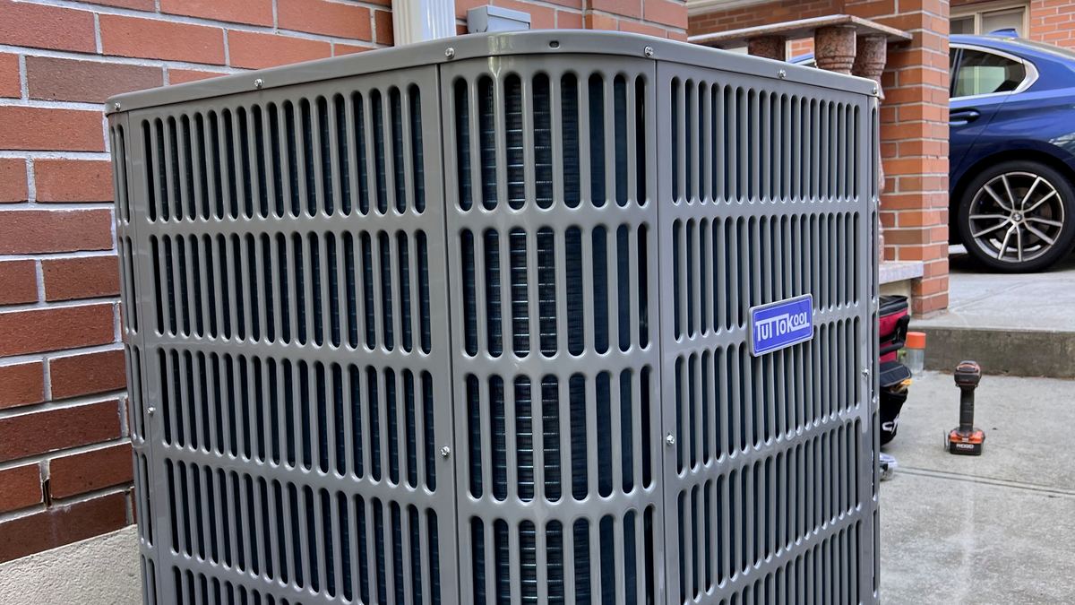 Central air conditioning outdoor condenser unit installed outside a New York building